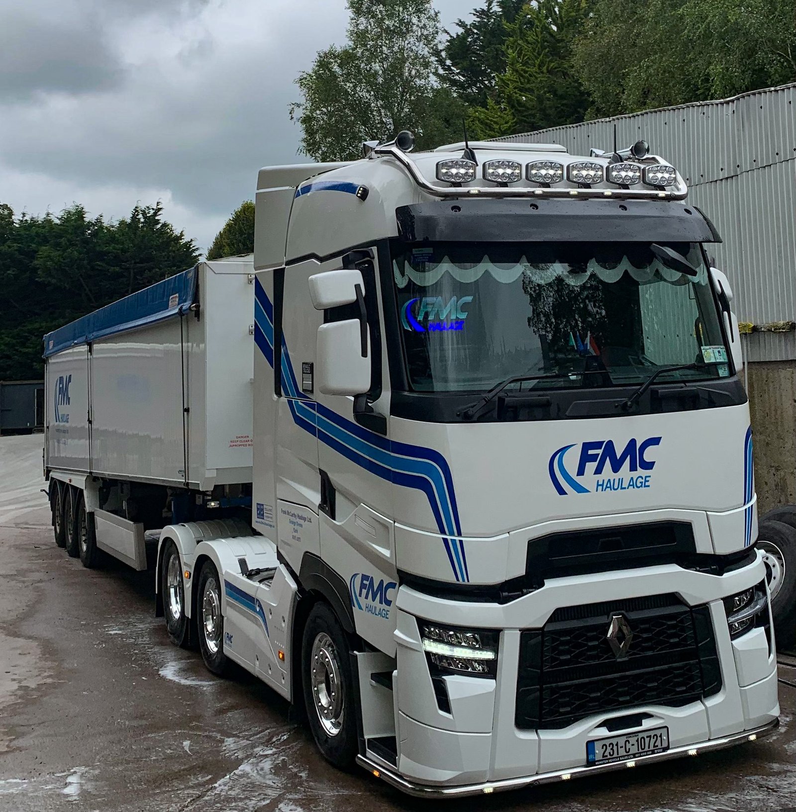 FMC Renault with bulk grain trailer at the yard